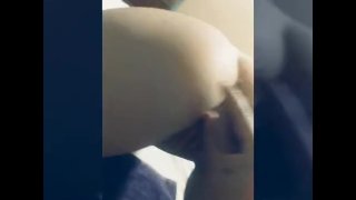 Girlfriend takes fat dildo from the back