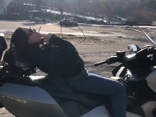 Motorbyke smoking dangling