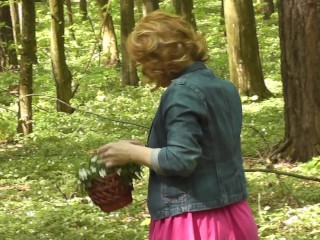 Milf of PornHub in mini dress without panties_collects flowers. Spring.