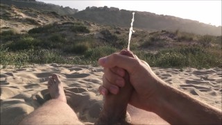 Slowmotion Video Of A Man Masturbating On A Nudist Beach