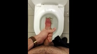 A Horny Adolescent Is Wanking And Cumming In The School Restroom