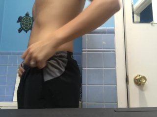 Teen undressing after cross country practice for shower