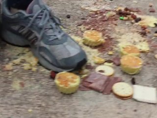 MILF crushes food under her_heels outdoors