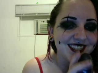 Horny Harley Quinn tit fucks Baty when Joker is away