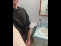 Jerking cock in bathroom