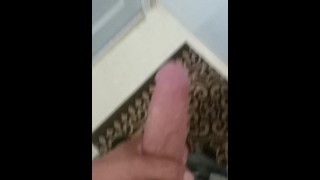 Jerking cock in bathroom