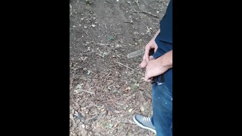 My man pissing in the woods