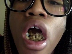 Chewing Lucky Charms for the Camera