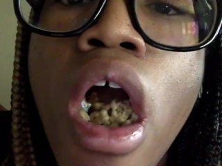 Chewing Lucky Charms for the Camera