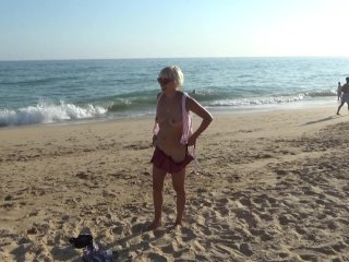 Naked Blonde on_a Nude_Beach. Masturbating and_Pissing.