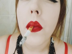 CIGARETTE DANGLING AND SMOKING CLOSE UP WITH RED LIPS