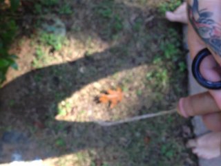 Naked in the yard, pissing all over my slim tattooed legs and feet :)