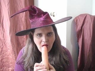 Halloween witch sucking a dildo