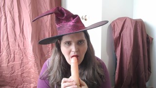 Halloween witch sucking a dildo