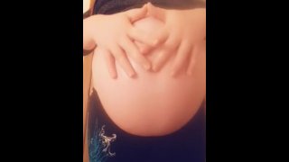 A Large Swollen Pregnant Belly With A Lovely Princess Inside
