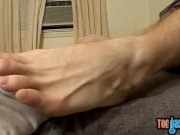 Preview 1 of Pretty twinkie with adorable feet rubs his cock and cums