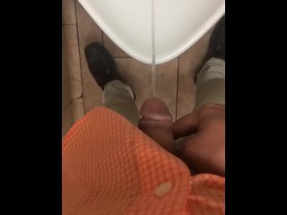 Boy pissing at work