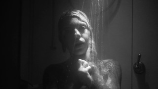 Blonde teen taking a bath