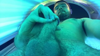 Rubbing one out in a tanning bed
