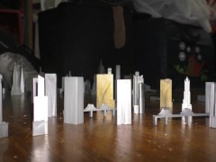 Towering Titan in Black Patent Stiletto Boots (Teaser)