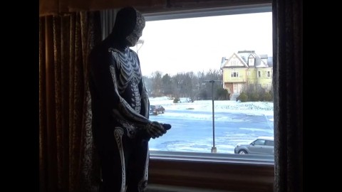 Dawn of the dead morphsuit in window cums into black rubber cock extender