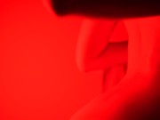 Solo nude girl in oil dancing in red light to the Weeknd music