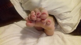 Bare feet and soles - red toenails and sexy toes spread