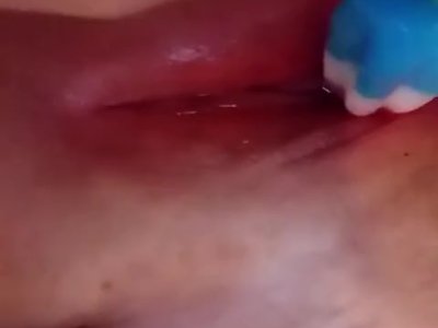 Slut plays with popsicle in her fat pink pussy