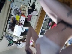 Topless morning cigarette after putting on lipstick in panties & flannel