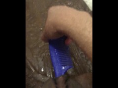 Masturbating with my blue comb when taking shower