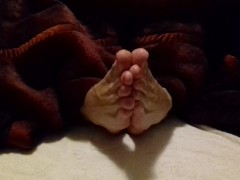 Lubed feet and soles rubbing each other - spreading toes