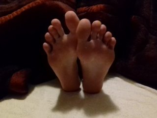 Lubed feet and soles rubbing each other - spreading toes