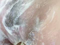 Rubbing my swollen pussy in the shower