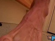 Clyde takes off shoes for foot worship and masturbation