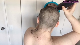A Young Woman With A Large Beard Shaves Her Head Until It Is Completely Bald