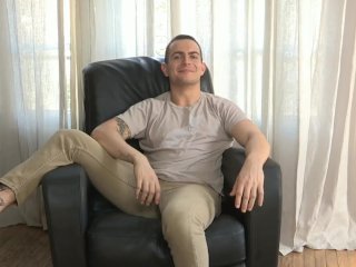 Ryan bends over the chair and spreads his ass
