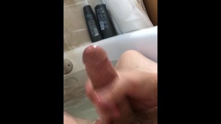 White Cock stroking in the bath tub with baby oil POV