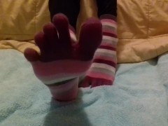 Spreading my toes and showing you my feet and soles in toe socks