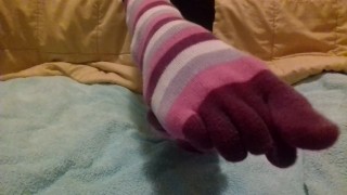 Spreading my toes and showing you my feet and soles in toe socks