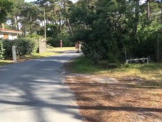 Riding an electric scooter naked through the village