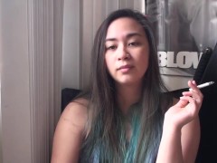 Miss Dee Nicotine having her morning Cigarette