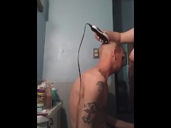 Chubby girl shaving husband bald