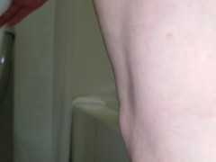 Riding a suction cup dildo in the bathtub