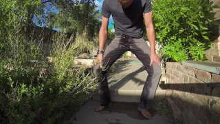 Pissing Grey Jeans In A Huge Flood Outdoors