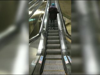 Wearing Latex on public escalator