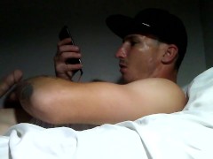 Tattooed white boy masturbates watching porn
