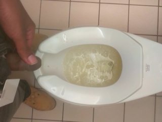 Black guy pisses at work