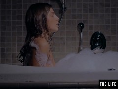 Skinny teen masturbating in the bathtub