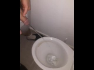 Boy pissing toilet