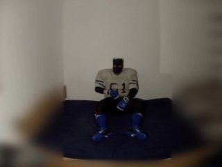 Rufus pawing off in Football Gear